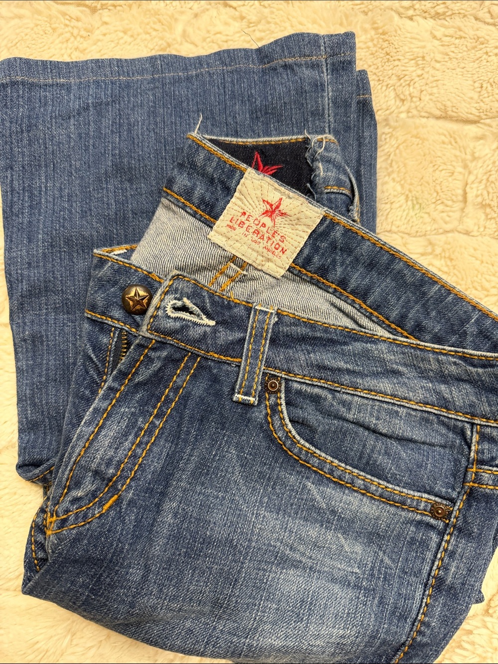 People's Liberation Medium Blue Bootcut Jeans with Star Button Detail